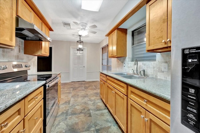 11438 Sageyork Dr, Houston, TX 77089 - kitchen featuring a sink, under cabinet range hood, stainless steel range with electric cooktop, and tasteful backsplash