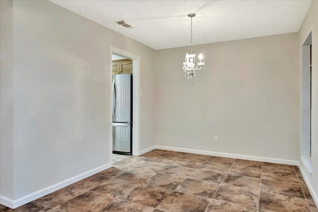 11438 Sageyork Dr, Houston, TX 77089 - unfurnished dining area with visible vents, stone finish flooring, baseboards, and a chandelier