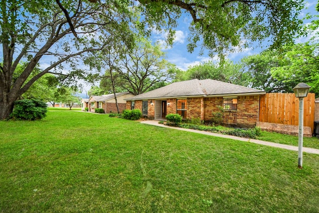 15510 Jersey Dr, Jersey Village, TX 77040 - view of front of home featuring brick siding and a shingled roof