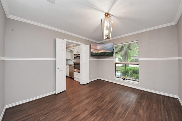 15510 Jersey Dr, Jersey Village, TX 77040 - unfurnished bedroom with dark wood-style floors, a chandelier, and crown molding