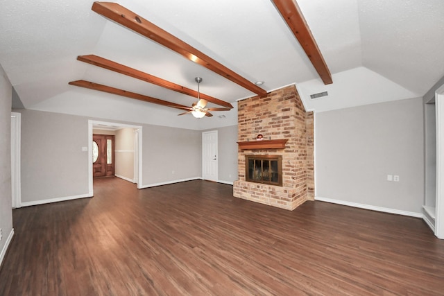 15510 Jersey Dr, Jersey Village, TX 77040 - unfurnished living room with ceiling fan, wood finished floors, and a brick fireplace