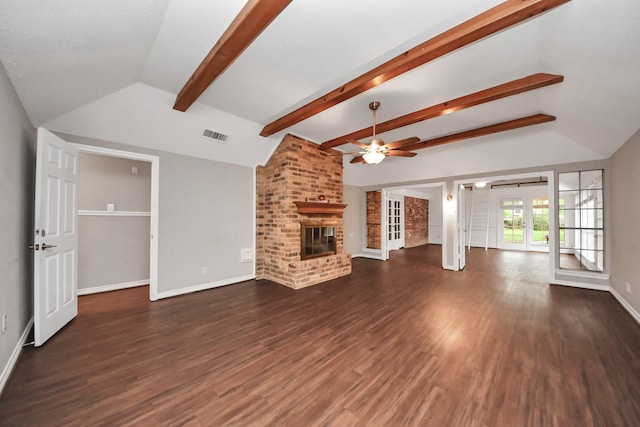 15510 Jersey Dr, Jersey Village, TX 77040 - unfurnished living room with a ceiling fan, a fireplace, wood finished floors, and french doors