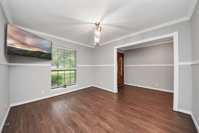 15510 Jersey Dr, Jersey Village, TX 77040 - spare room with wood finished floors, a chandelier, and crown molding
