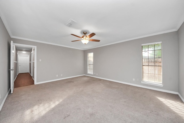 15510 Jersey Dr, Jersey Village, TX 77040 - empty room featuring ceiling fan, visible vents, carpet floors, baseboards, and ornamental molding