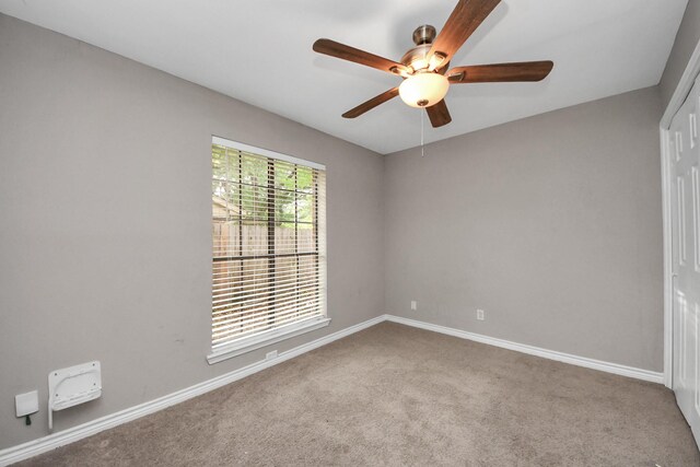 15510 Jersey Dr, Jersey Village, TX 77040 - carpeted spare room with ceiling fan and baseboards