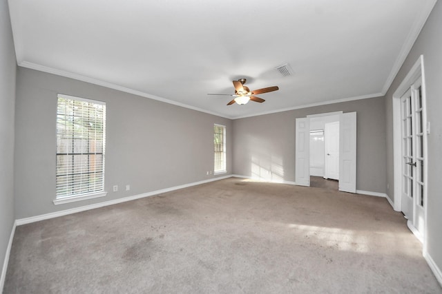 15510 Jersey Dr, Jersey Village, TX 77040 - unfurnished room featuring crown molding, a ceiling fan, healthy amount of natural light, and carpet floors