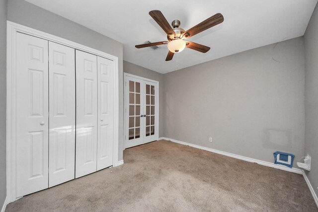 15510 Jersey Dr, Jersey Village, TX 77040 - unfurnished bedroom featuring french doors, carpet floors, a closet, and ceiling fan