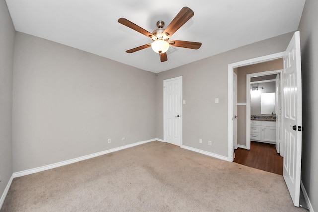 15510 Jersey Dr, Jersey Village, TX 77040 - unfurnished bedroom with dark colored carpet and ceiling fan