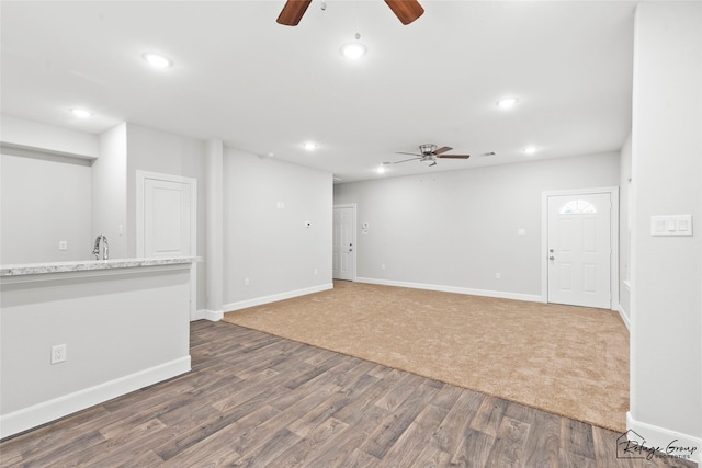 interior space featuring ceiling fan and recessed lighting