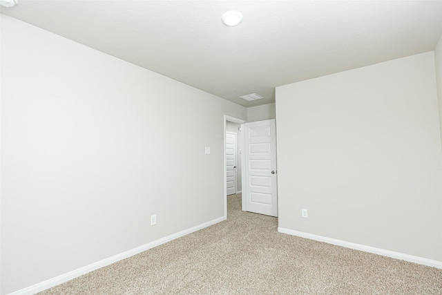 2897 Briggs Dr, Conroe, TX 77301 - empty room with light colored carpet, baseboards, and visible vents