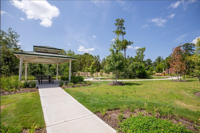 view of community featuring a gazebo and a lawn