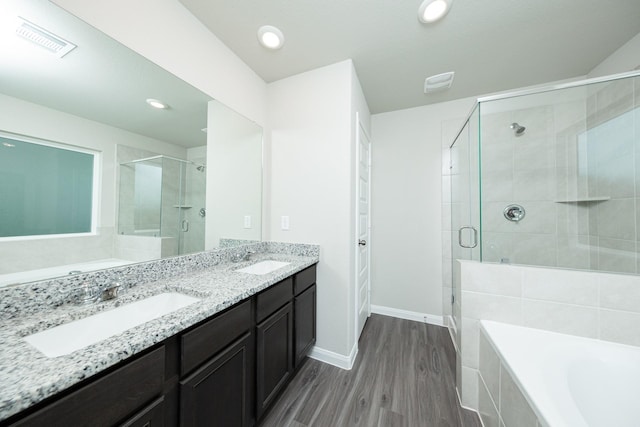5107 Hector Gustavo Dr, Rosharon, TX 77583 - full bath featuring a garden tub, visible vents, and a sink