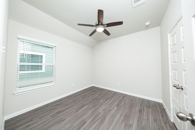 5107 Hector Gustavo Dr, Rosharon, TX 77583 - spare room featuring wood finished floors, visible vents, baseboards, ceiling fan, and lofted ceiling