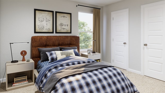 bedroom featuring carpet flooring and baseboards