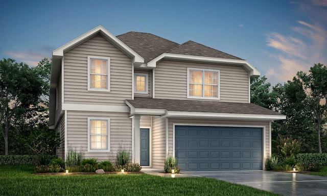 traditional home featuring an attached garage, driveway, and a shingled roof