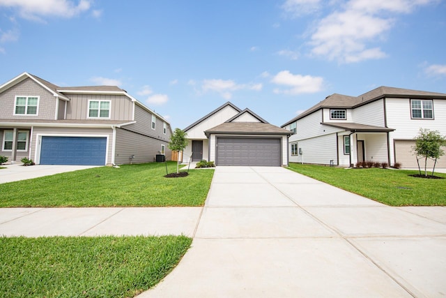 5114 Hector Gustavo Dr, Rosharon, TX 77583 - view of front of home featuring a garage, a front lawn, cooling unit, and board and batten siding