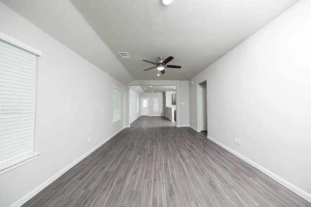 5114 Hector Gustavo Dr, Rosharon, TX 77583 - unfurnished living room with visible vents, wood finished floors, baseboards, and ceiling fan