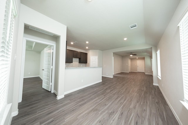 5114 Hector Gustavo Dr, Rosharon, TX 77583 - unfurnished living room with dark wood-type flooring, baseboards, a ceiling fan, and recessed lighting
