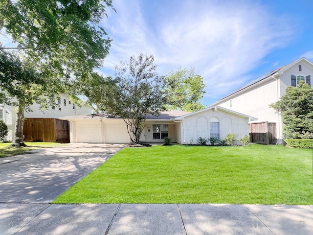 view of front of home featuring a garage and driveway