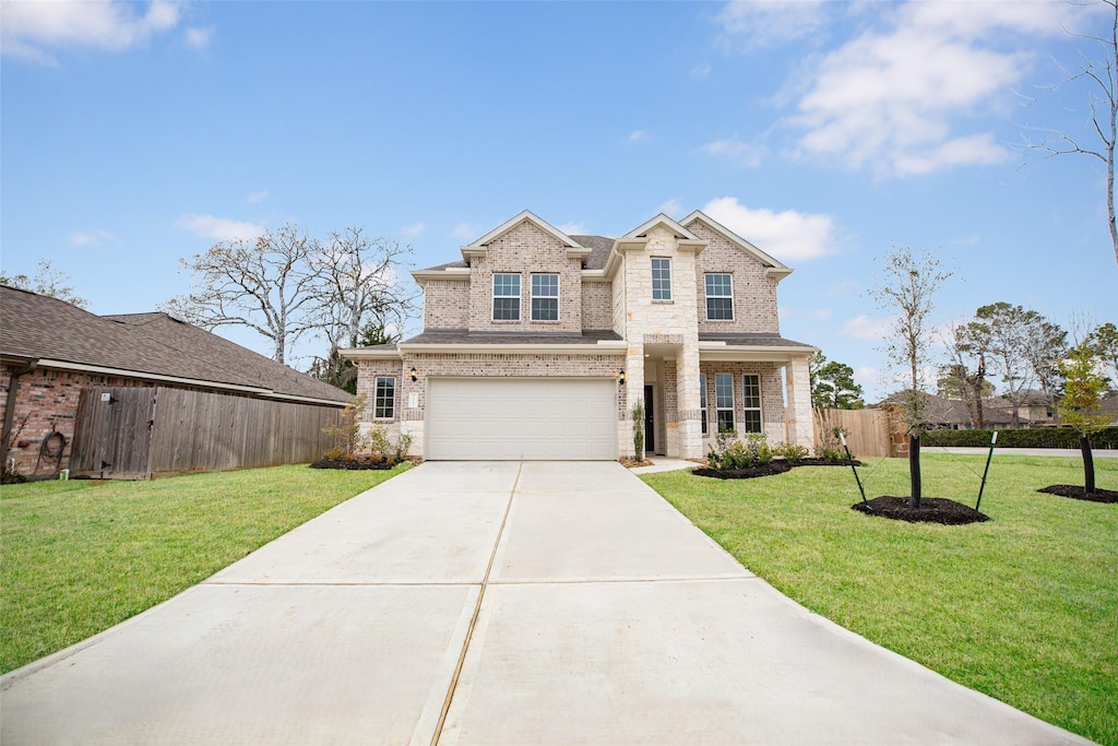 13502 Summer Hill Dr, Montgomery, TX 77356 - traditional home featuring an attached garage, fence, a front yard, and concrete driveway