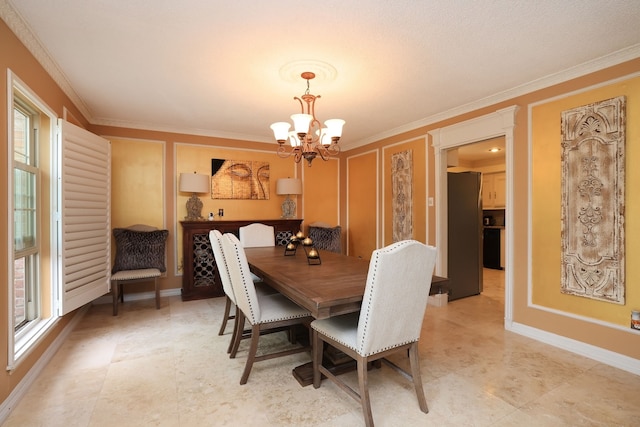 5503 Pebble Springs Dr, Houston, TX 77066 - dining area featuring crown molding, a chandelier, and baseboards