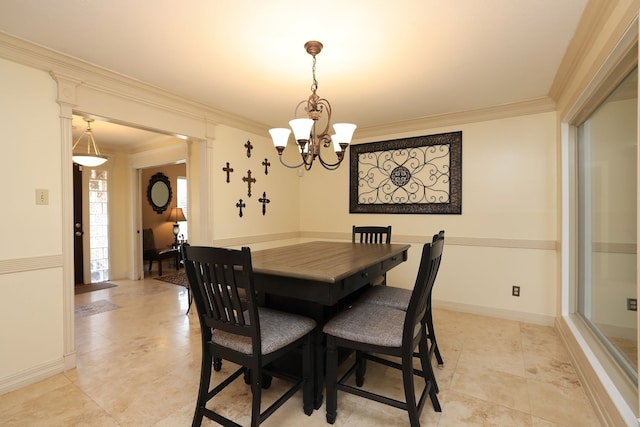 5503 Pebble Springs Dr, Houston, TX 77066 - dining area featuring ornamental molding, a chandelier, light tile patterned floors, and baseboards