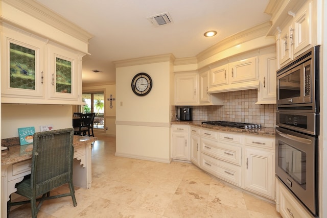 5503 Pebble Springs Dr, Houston, TX 77066 - kitchen with appliances with stainless steel finishes, crown molding, light stone countertops, backsplash, and glass insert cabinets
