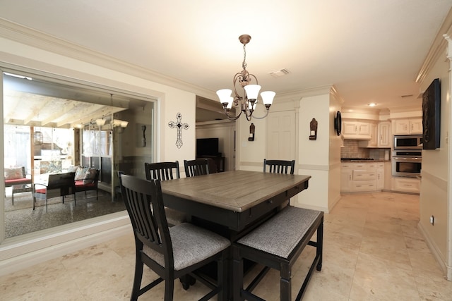 5503 Pebble Springs Dr, Houston, TX 77066 - dining room featuring a chandelier, ornamental molding, and baseboards
