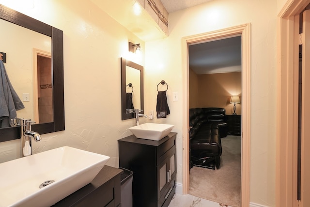 5503 Pebble Springs Dr, Houston, TX 77066 - bathroom with a sink and marble look tile flooring