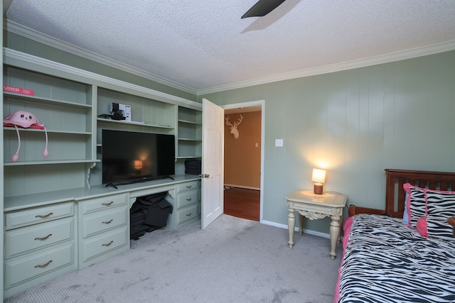 5503 Pebble Springs Dr, Houston, TX 77066 - bedroom featuring crown molding, light carpet, a textured ceiling, a ceiling fan, and baseboards