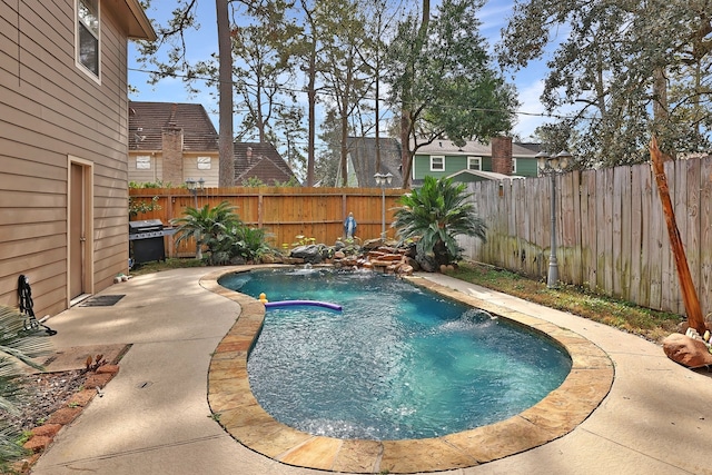 5503 Pebble Springs Dr, Houston, TX 77066 - view of swimming pool with a fenced backyard, grilling area, and a patio