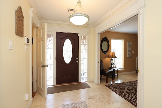 5503 Pebble Springs Dr, Houston, TX 77066 - entryway with crown molding, baseboards, and light tile patterned flooring