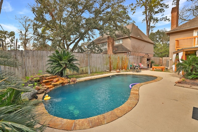 5503 Pebble Springs Dr, Houston, TX 77066 - view of swimming pool with a fenced backyard and a patio