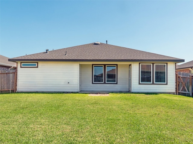 711 Boer Plains Dr, Rosharon, TX 77583 - back of property featuring a shingled roof