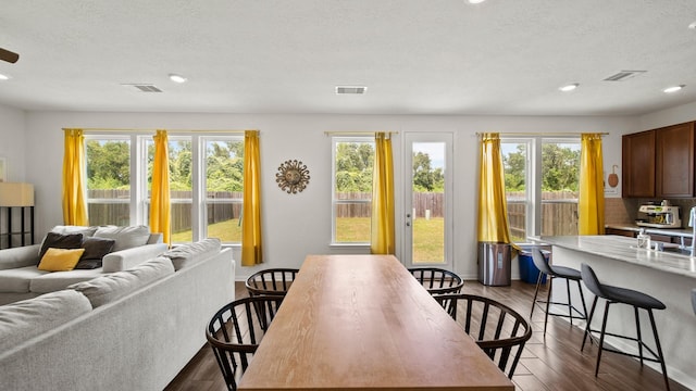 6630 Elks Trce, Richmond, TX 77406 - dining room with dark wood-style flooring, recessed lighting, and visible vents