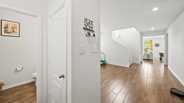 6630 Elks Trce, Richmond, TX 77406 - hallway with stairway, baseboards, recessed lighting, and wood finished floors