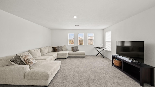 6630 Elks Trce, Richmond, TX 77406 - carpeted living area with baseboards and visible vents