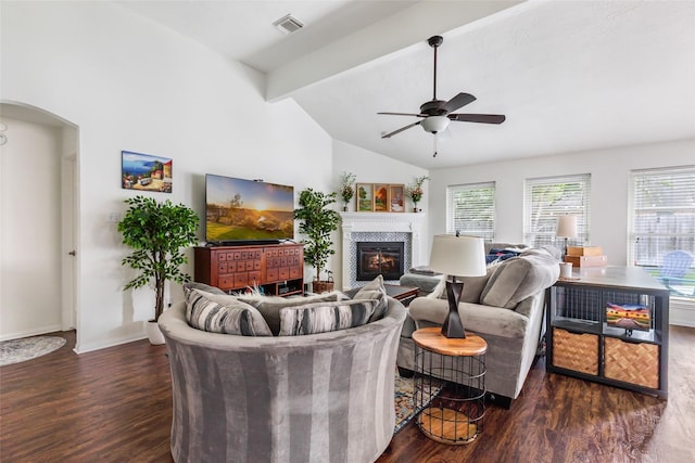 living area featuring wood finished floors, ceiling fan, and healthy amount of natural light