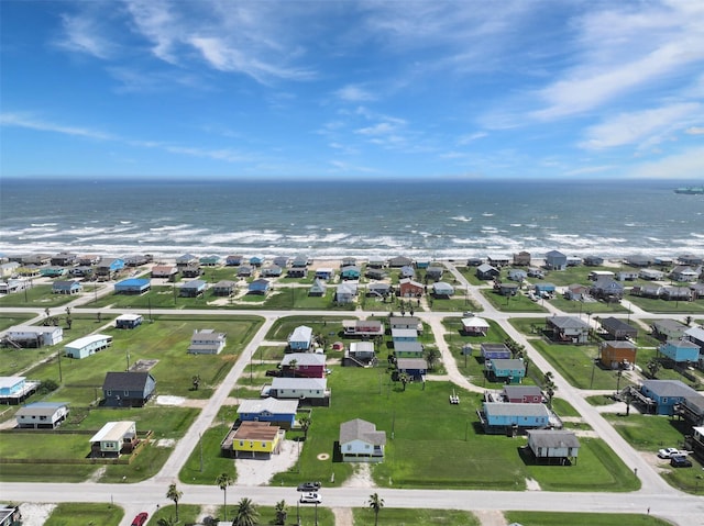 drone / aerial view featuring a water view and a residential view