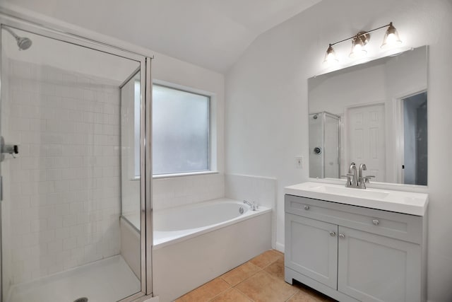 67 N Winterport Cir, The Woodlands, TX 77382 - full bath with a stall shower, vanity, a bath, tile patterned floors, and lofted ceiling