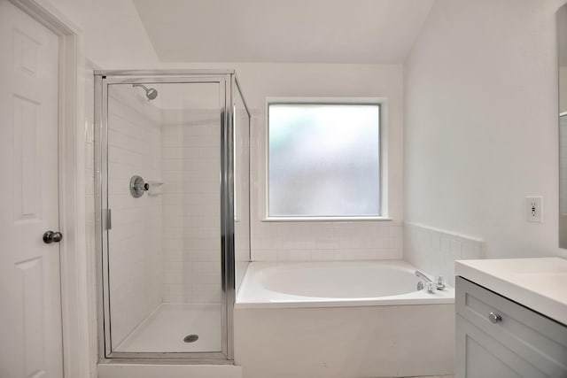 67 N Winterport Cir, The Woodlands, TX 77382 - full bathroom with a garden tub, a stall shower, and vanity