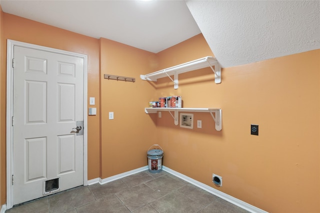 23106 Willow Canyon Dr, Katy, TX 77494 - laundry area with electric dryer hookup, hookup for a washing machine, baseboards, and tile patterned floors