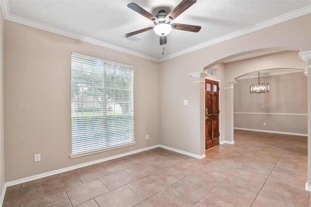 23106 Willow Canyon Dr, Katy, TX 77494 - empty room featuring ornate columns, arched walkways, a ceiling fan, ornamental molding, and light tile patterned floors