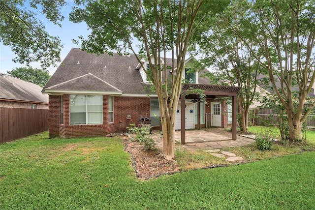 23106 Willow Canyon Dr, Katy, TX 77494 - back of property featuring ceiling fan, brick siding, a patio, and roof with shingles