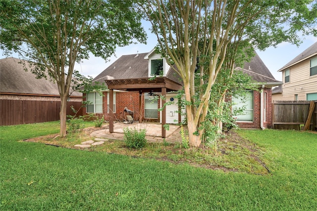 23106 Willow Canyon Dr, Katy, TX 77494 - rear view of property featuring a patio, brick siding, a shingled roof, and ceiling fan
