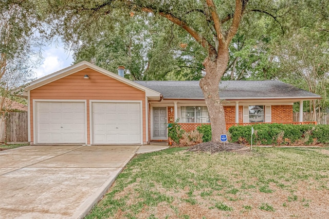 7022 Triola Ln, Houston, TX 77074 - ranch-style house featuring brick siding, a garage, fence, and concrete driveway