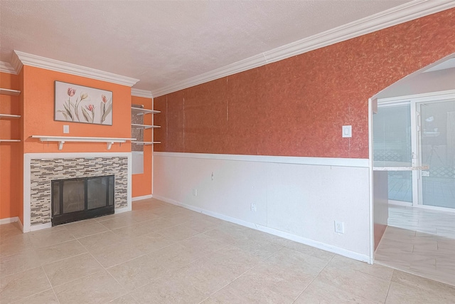 7022 Triola Ln, Houston, TX 77074 - unfurnished living room with crown molding, a fireplace, a textured ceiling, tile patterned floors, and baseboards