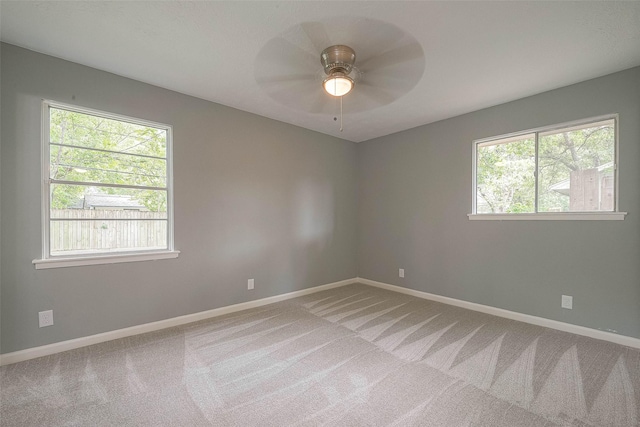 7022 Triola Ln, Houston, TX 77074 - empty room featuring baseboards, carpet flooring, and a ceiling fan