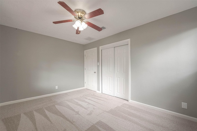 7022 Triola Ln, Houston, TX 77074 - unfurnished bedroom with baseboards, a closet, carpet flooring, and visible vents