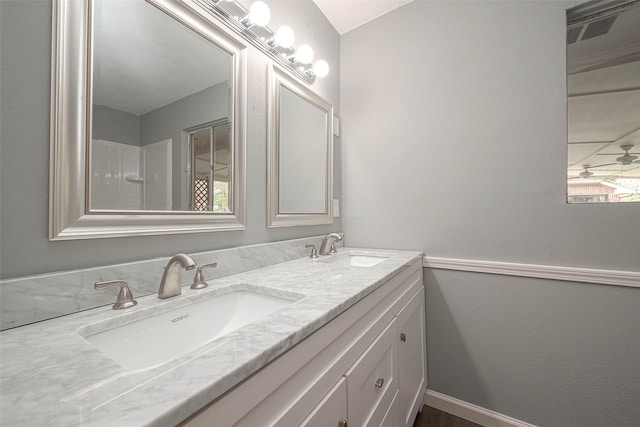 7022 Triola Ln, Houston, TX 77074 - bathroom with a sink and double vanity